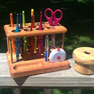 Colorful crochet hooks in wooden organizer